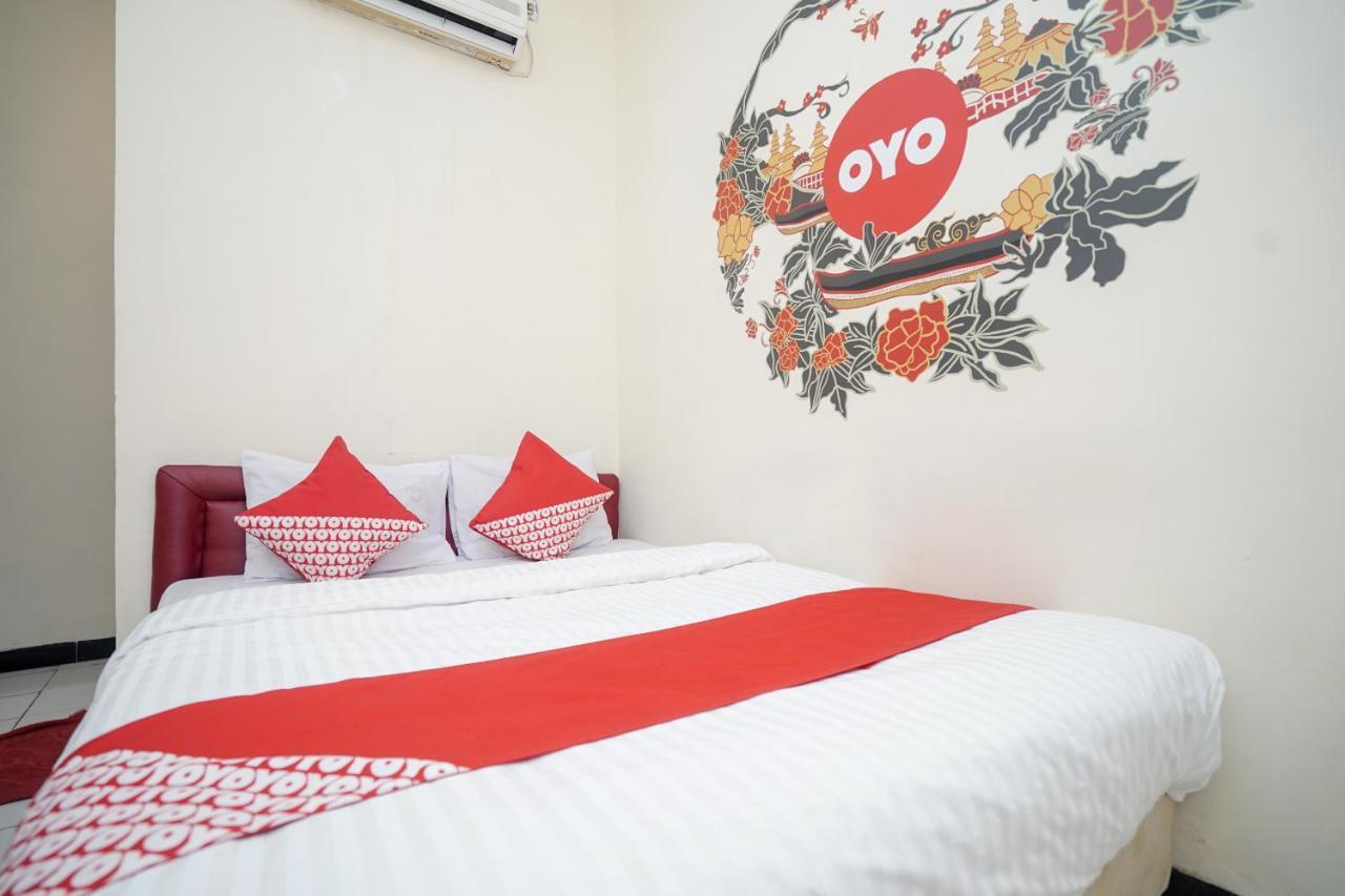 Oyo448中央酒店 巨港 外观 照片